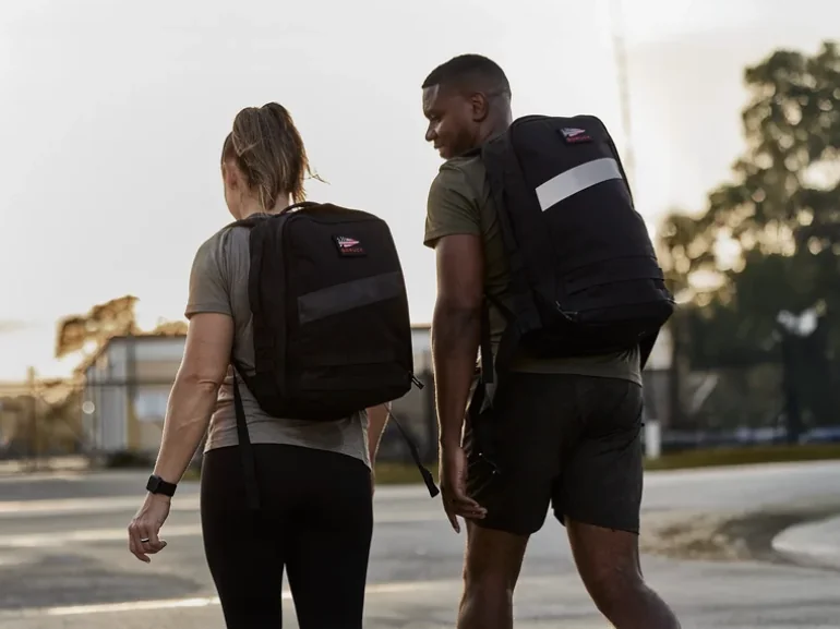 Two ruckers wearing GORUCK packs